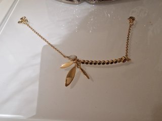 Pulsera Tous dorada con piedras