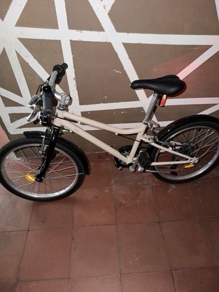 Bicicleta plegable color crema