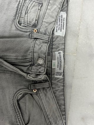 Pantalones Stradivarius grises rotos