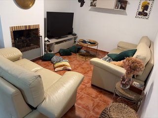 Sofá de 3 y 2 plazas de cuero crema,