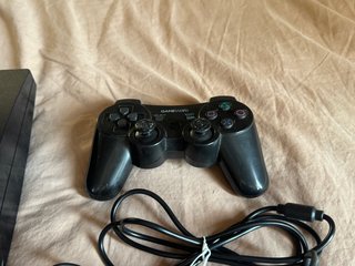 PS3 Slim Nera con controller