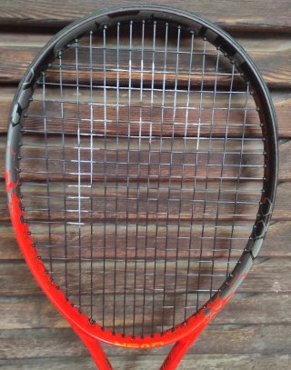 Raqueta Head Radical JR 26 y Raquetero