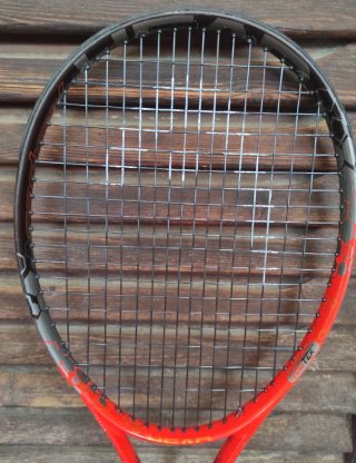 Raqueta Head Radical JR 26 y Raquetero
