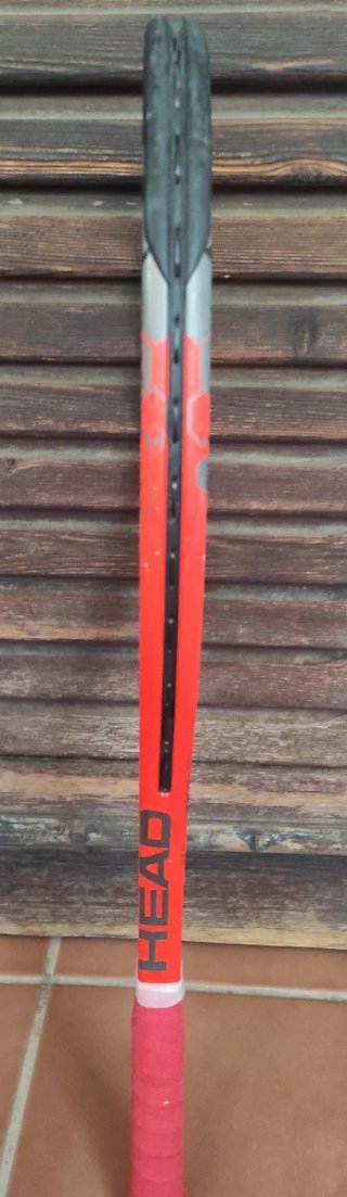 Raqueta Head Radical JR 26 y Raquetero