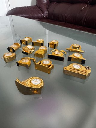 Lote 14 relojes colección miniatura dorados