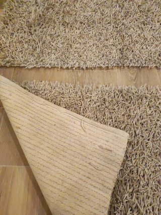 Alfombras beige de tela