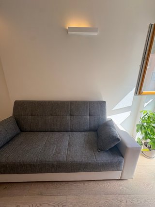 Divano letto con contenitore grigio/bianco