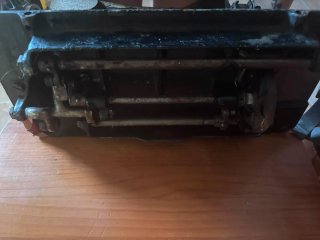 Cabeza de máquina de coser antigua