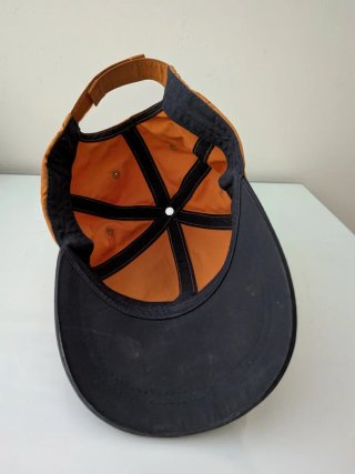 Gorra Quechua niño naranja y negra