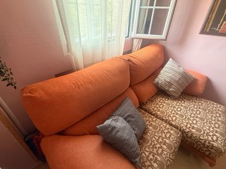 Sofá extensible tela naranja y marrón