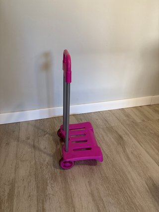 Carrito porta mochila rosa fucsia
