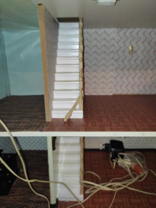 Casa de muñecas de madera con accesorios