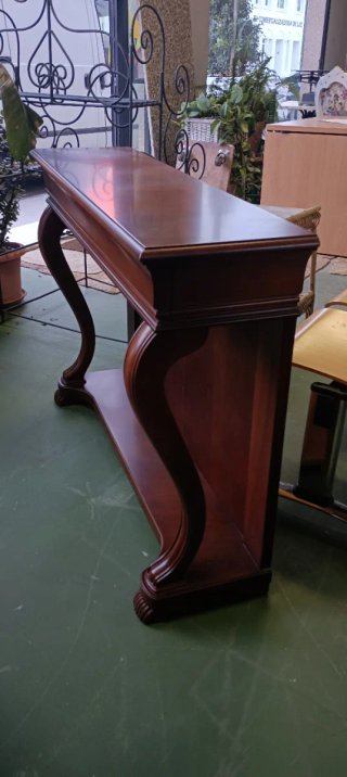 Entradita de madera oscura