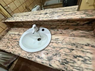 Mueble de baño mármol y madera