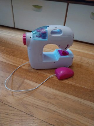 Máquina de coser de juguete