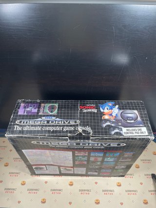 Console Sega Mega Drive in scatola