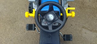 Tractor a pedales con pala y remolque New Holland