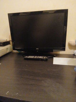 Televisión OKI Negra con Mando y TDT