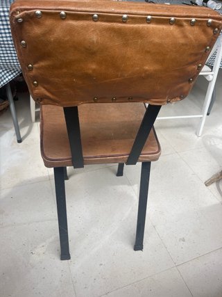 Silla retro de hierro y cuero