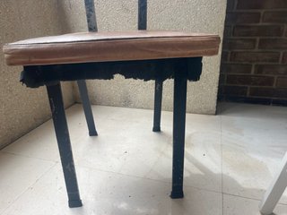Silla retro de hierro y cuero