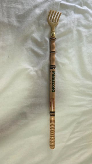 Rascador de espalda de madera