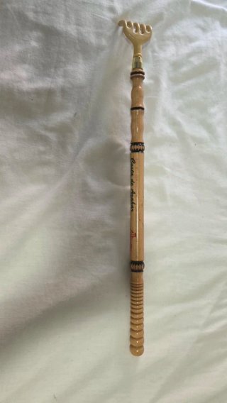 Rascador de espalda de madera