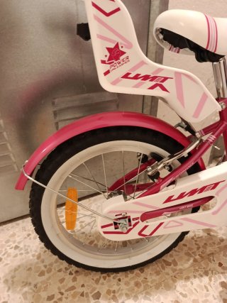 Bicicleta infantil rosa y blanca