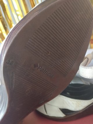 Sandalias de piel con cuña