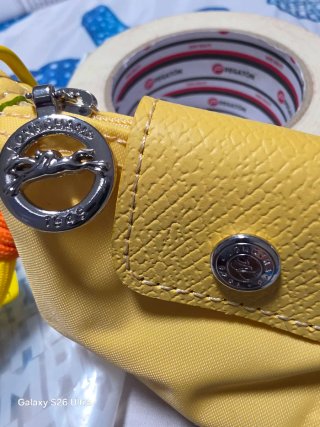 Mini neceser monedero Longchamp amarillo