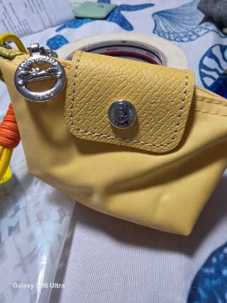 Mini neceser monedero Longchamp amarillo