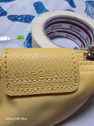 Mini neceser monedero Longchamp amarillo