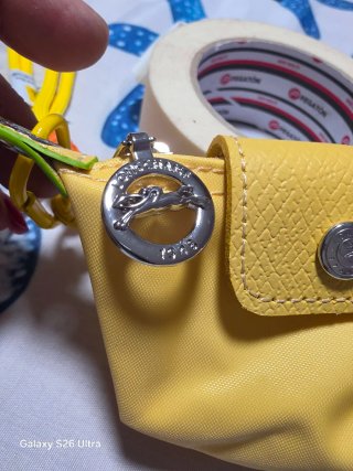 Mini neceser monedero Longchamp amarillo