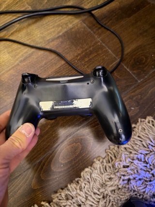 PS4 (PlayStation 4) con 2 controller.