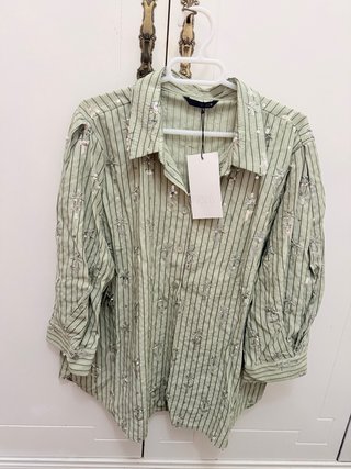 Camisa Zara verde con estrellas