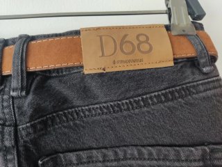 Pantalones vaqueros anchos negros, con cinturón