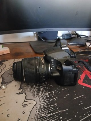 Nikon D5100 + Lente 18-55mm
