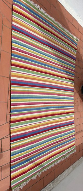 Alfombra multicolor a rayas
