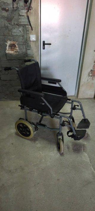 Silla de ruedas, plegable.
