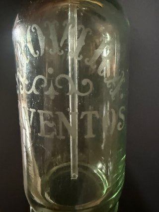 Sifón antiguo de vidrio verde