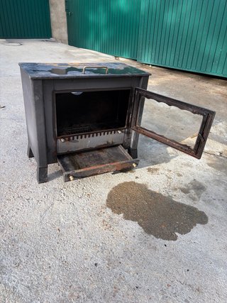Estufa de leña con placa para calentar