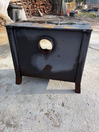 Estufa de leña con placa para calentar