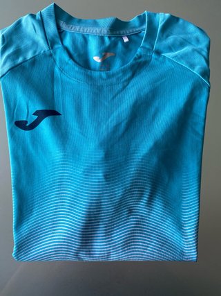 Camiseta deportiva Joma azul y turquesa
