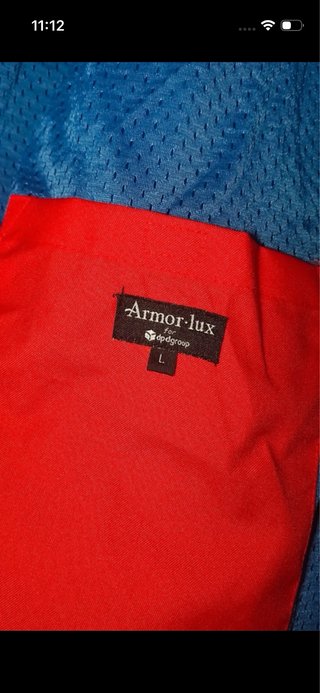Chaquetón impermeable SEUR azul y roja