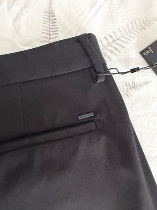 Tres pantalones negros Massimo Dutti