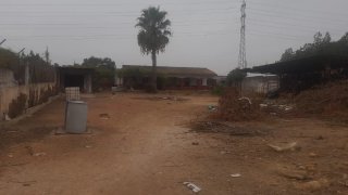 Terreno con casa