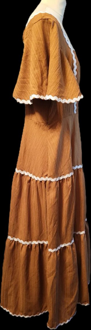Vestido largo marrón con volantes