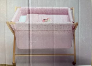 Minicuna tijera rosa poco uso.