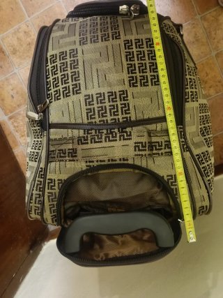Bolso de viaje tipo maleta con tirador