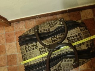 Bolso de viaje tipo maleta con tirador