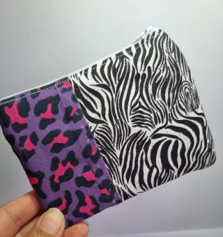 Monedero estampado leopardo y cebra